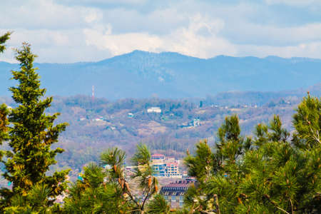 Aerial view of Sochi on the background of mountains in sunny day, Russia