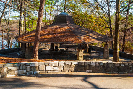 Big picnic area with tables and roof in the Stone Mountain Park in sunny autumn day, Georgia, USAの写真素材