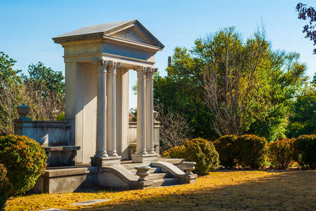 The monument in the form of a portico on the Oakland Cemetery in sunny autumn day, Atlanta, USAの写真素材