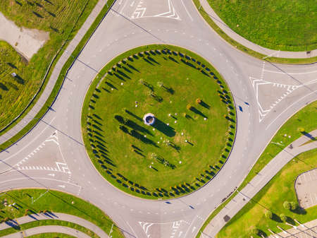 Top-down drone view of the roundabout in sunny day, Sochi, Russiaの写真素材