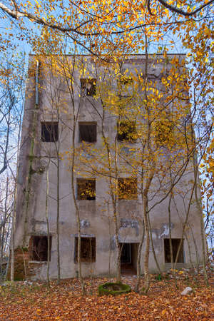 Abandoned building of the former restaurant on the top of Mount Akhun in sunny autumn day, Sochi, Russiaの写真素材