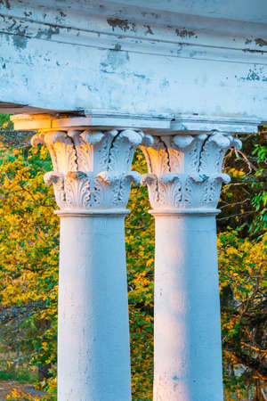 Columns of the abandoned building of the former restaurant on the top of Mount Akhun in sunny autumn day, Sochi, Russiaの写真素材