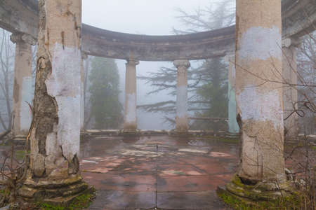 Rotunda of the abandoned building of the former restaurant on the top of Mount Akhun in dense fog, Sochi, Russiaのeditorial素材