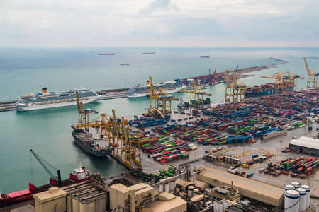 Barcelona, Spain - November 16, 2018: Aerial view of the Port of Barcelona and the Mediterranean Sea from the Montjuic mountain in overcast dayのeditorial素材