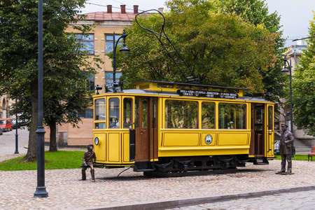 Vyborg, Leningrad Oblast, Russia - September 12, 2018: Tram Cafe on Bankovskiy Proyezd on the background of apartment building in overcast dayのeditorial素材