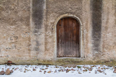 Door on facade of the urban historic building front view, Tallinn, Estoniaの写真素材