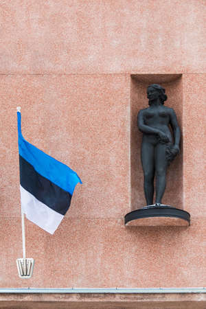Tallinn, Estonia - December 25, 2018: Facade of the Tallinn Art Hall with the Estonian flag and the Ilu sculpture by the Estonian sculptor Juhan Raudseppのeditorial素材