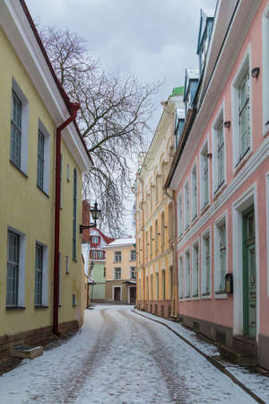 Perspective view of buildings on the Vaike Kloostri Street in overcast winter day, Tallinn Old Town, Estoniaの写真素材