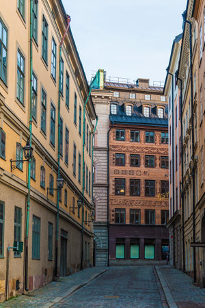 Perspective view of historical buildings on the Salviigrand Alley in winter day, Stockholm, Swedenの写真素材