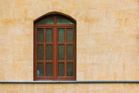 One window on the facade of the modern urban apartment building front view, Krasnaya Polyana, Sochi, Krasnodar Krai, Russiaの写真素材