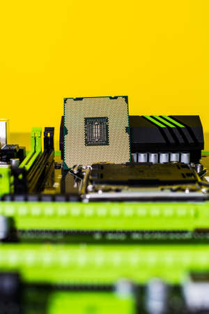 Motherboard closeup with blurry background. Computer components of the system unit.の写真素材