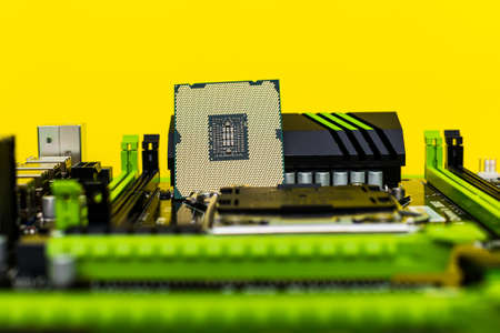 Motherboard closeup with blurry background. Computer components of the system unit.の写真素材