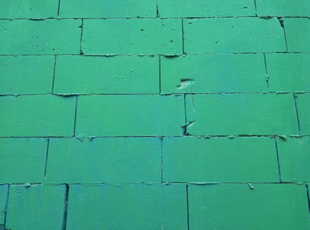 aerated concrete or foam concrete wall painted in green. color wallの写真素材