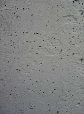 Gray porous concrete wall. Concrete textured wall.の写真素材