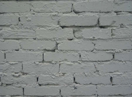 Background of gray brick wall pattern texture. The new painted wallの写真素材