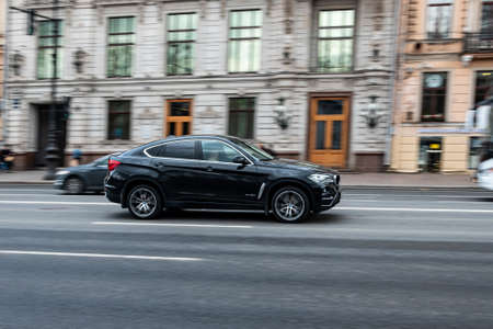 Black car at the city street.の写真素材