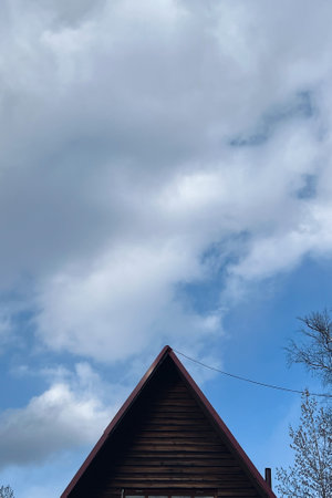 A part of Facade of a old and vintage wooden house. Natural photo. High quality photo