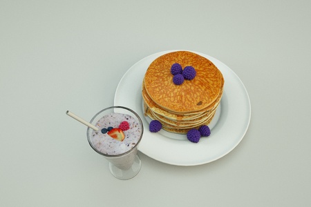 Glass of smoothies and Waffles with strawberryの写真素材