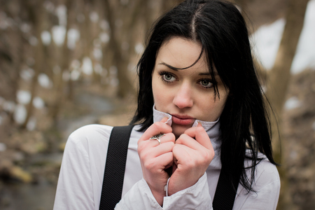 Portrait of a beautiful girl in the forest. The girl sad.のeditorial素材