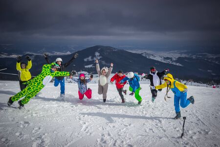 Dragobrat, Ukraine - December 26, 2018: Girls and boys ski ingly ski and snowboardのeditorial素材