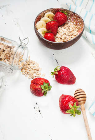 Healthy breakfast with cereals, banana and strawberry.の写真素材