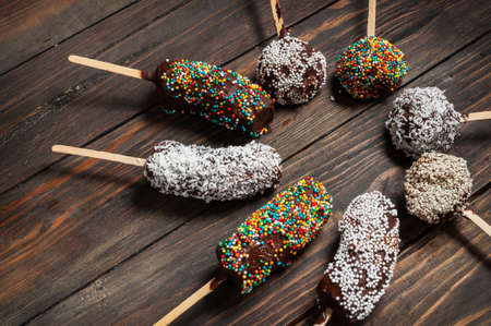 Chocobanana - traditional dessert in Guatemala of frozen banana dipped into hot chocolate.の写真素材