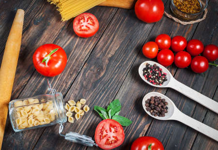 Mixed dried pasta selection on wooden background. Top viewの写真素材