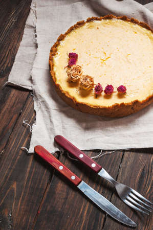 Homemade cheesecake - healthy organic summer dessert pie cheesecake. Cheese cake on blue wood table.