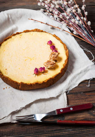 Homemade cheesecake - healthy organic summer dessert pie cheesecake. Cheese cake on blue wood table.の写真素材