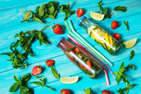 Detox fruit infused water. Refreshing summer homemade cocktail, selective focus.の写真素材