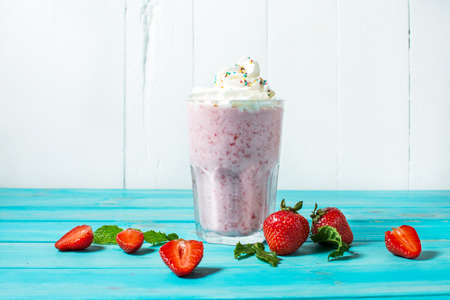 Strawberries milk shake and fresh fruit strawberry. Cocktail with milkの写真素材