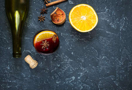 Mulled wine recipe ingredients on black chalkboard with text space.の写真素材