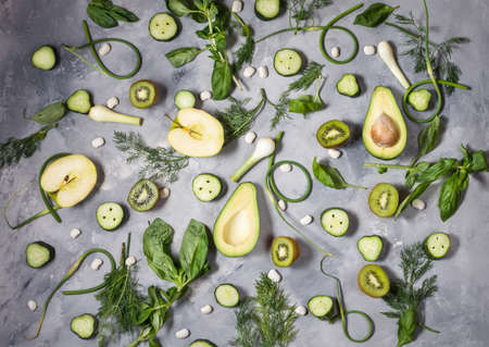 Flat lay fresh vegetables, fruits and herbs on concrete background.の写真素材