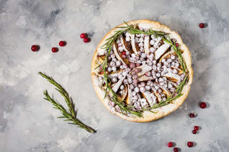 Apple pies with cranberry on concrete background.の写真素材