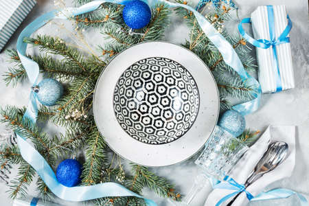 Beautiful Christmas table setting with decorations. Preparation for christmas dinner. Top viewの写真素材