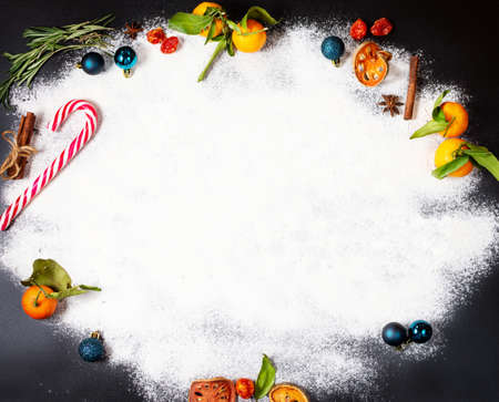 Plase for text on flour and Christmas Decorations on stone background. New Year greeting card.
