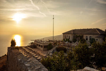 Sarande, Albania - 08.092019 Lekuresi Castle Restaurant at sunset