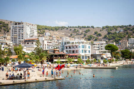 Sarande, Albania - 08.09.2019 Main city promenade and public beach - Summerのeditorial素材