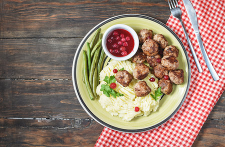 Swedish meatballs with mashed potatoes and green beans. Top viewの写真素材