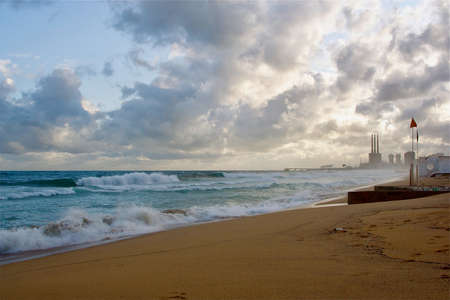 A grey stormy day on a beachの写真素材