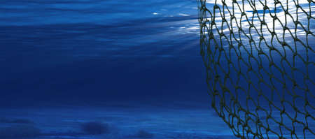 The dark green fishing net in the seaの写真素材