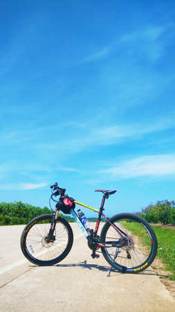 A bicycle on the road in a clear skyのeditorial素材