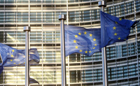 Flags of European Union in front of European Commissionの写真素材