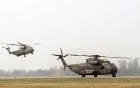 Military helicopters on military airport