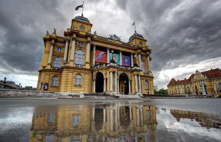 Croatian National Theatre reflection in water after spring showerのeditorial素材