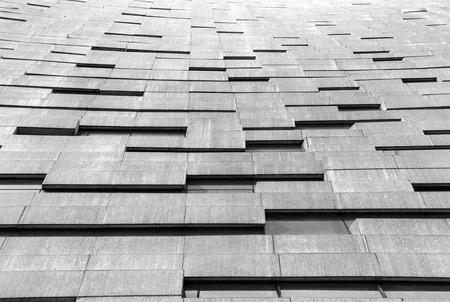Close up structure of modern building. Grey colored city wall. Grunge backgraund.の写真素材
