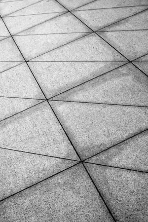 Close up structure of modern building. Grey colored city wall. Grunge backgraund.の写真素材