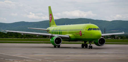 Russia, Vladivostok, 05/26/2017. Passenger airplane Airbus A320 of S7 on airfield.のeditorial素材