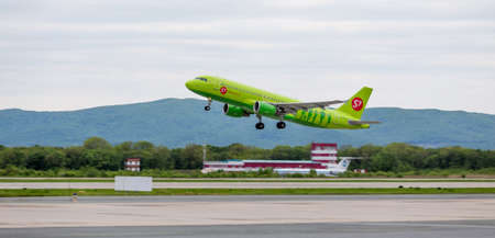 Russia, Vladivostok, 05/26/2017. Passenger airplane Airbus A320 of S7 company takes off.のeditorial素材