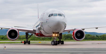 Russia, Vladivostok, 05/26/2017. Passenger airplane Boeing 777-300 of Rossiya company just landed.
